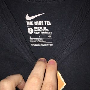 Men’s yellow Nike T-shirt